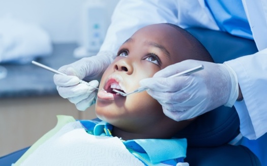 Dentists can help identify and treat oral problems that can otherwise hinder a child's development. (Adobe Stock)