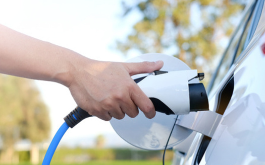 There are more than 200,000 jobs in the auto industry in Michigan, and a new report says building more electric vehicle-charging stations would create more. (paulynn/Adobe Stock)