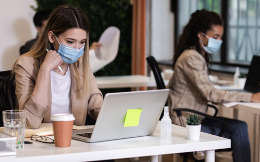 The Centers for Disease Control and Prevention recommends employees wear face masks to help prevent the spread of COVID-19. (Adobe Stock)