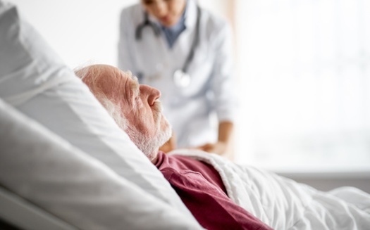Geriatric medicine physicians in the Commonwealth say they're seeing more terminally ill patients travel out of state to receive medical aid-in-dying services. (Adobe Stock)
