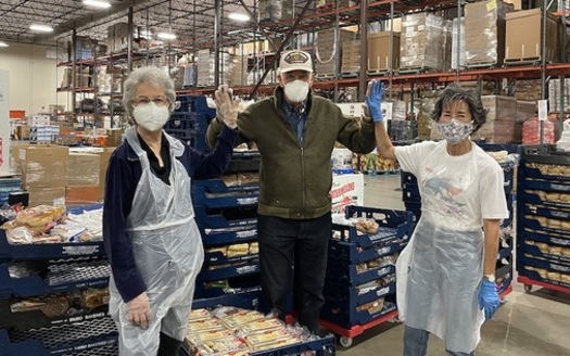 Geneva Ortiz, Tom Elmhorst and Mildred Griffee sort surplus bread as weekly volunteers for Albuquerque's Roadrunner Food Bank. (courtesy photo: rrfb)