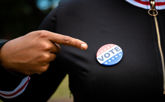 A new study recommends more voter education about vote centers for groups with lower turnout at the polls, in particular for younger people and communities of color. (Lamar Carter/Adobestock)