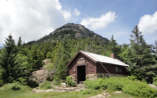 <a href="https://www.fs.usda.gov/recarea/whitemountain/recarea/?recid=74867" target="_blank">Jim Liberty Cabin is on the site of Peak House</a>, a hotel that was built in 1891 and eventually destroyed by a windstorm. (NH Division of Historical Resources)