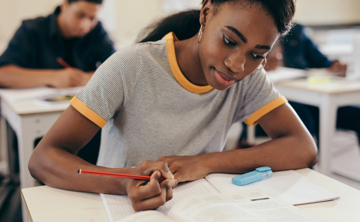 Georgetown researchers found that Black American women are the most likely to have to turn to student loans for college, and hold the most student loan debt, compared with their peers. (Adobe Stock)