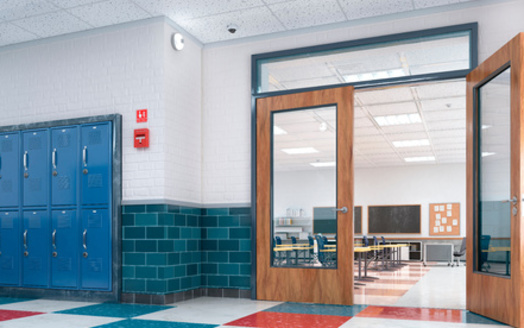 Instead of arming teachers, young labor leaders in Minnesota say fostering a more welcoming environments in schools with adequate support staff can help with creating safe buildings and campuses. (Adobe Stock)