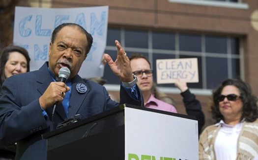 The Rev. Leonard Jackson speaks at a clean-energy rally in 2017. His Faith Organizing Alliance says the Juneteenth message of freedom can also be helpful in motivating people to work toward curbing climate change. (Steve Marcus)