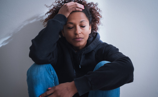 Some abusers use gaslighting and control tactics to undermine their partner's ability to leave. (Adobe Stock)