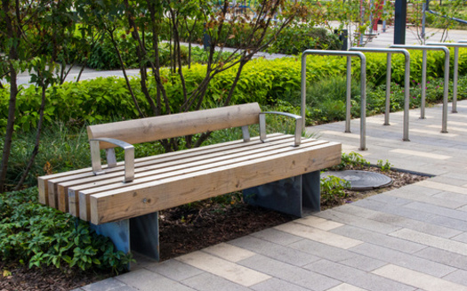 Those involved with AARP's Community Challenge grant program say smaller efforts, such as installing park benches in an undeserved area, can go a long way in helping to make a place livable for everyone. (Adobe Stock)