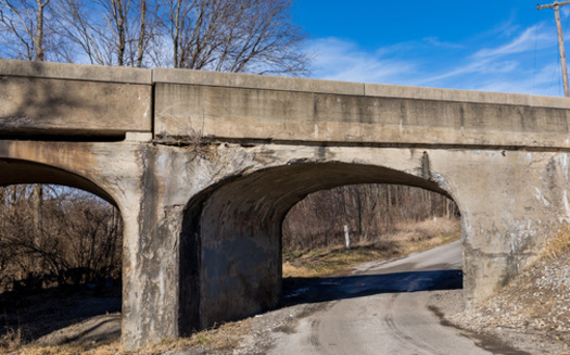 In addition to crumbling roads in rural areas, the Wisconsin Department of Transportation rates 980 bridges across the state as structurally deficient. (Adobe Stock)