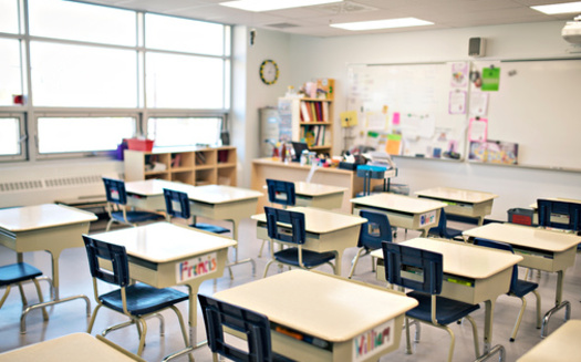 An annual report on child well-being finds Iowa has some stronger results in education, including the percentage of high school students graduating on time. But certain proficiency metrics drag down the state's overall performance. (Adobe Stock)
