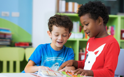 While the number of high school students graduating on time has risen, a new report showed early education is stunted in the state of New York. (Adobe Stock)