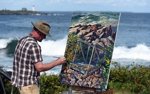 Maine artist Russel Whitten creates an ocean scene at East Point Audubon Sanctuary at Biddeford Pool. (Elizabeth Creamer/Maine Audubon)