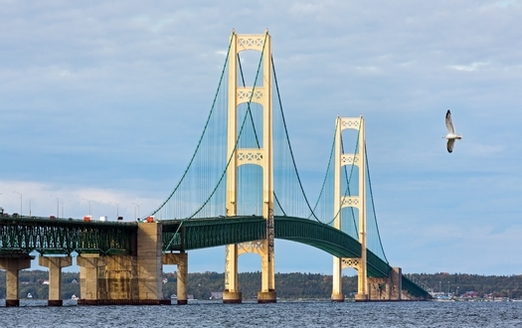 The 26,000-foot Mackinac Bridge runs over the Straits of Mackinac, connecting Michigan's Upper Peninsula with the main part of the state. (Kenneth Kiefer/Adobe Stock)