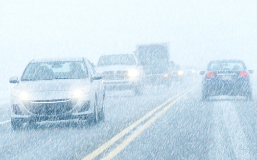 Working headlights are an important component of safe driving when it's snowing. (mario beauregard/Adobe Stock)