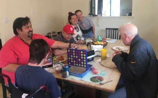 Direct support professionals enjoy recreational time with participants in program for people with developmental disabilities in Albuquerque. (Michele McCoy/ARCA)