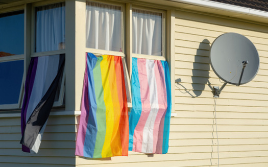 Displaying flags associated with the LGBTQ community is a protected action under the Fair Housing Act. (Michael/Adobe Stock)