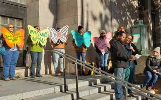 Homero Jose speaks to a crowd gathered at Bellingham City Hall in support of a center that would serve the community's immigrant populations. (Brenda Bentley)