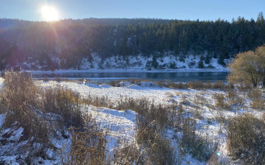 A photo from the top of the berm near the Smurfit-Stone site shows how close the Clark Fork River is. (Lisa Ronald/American Rivers)