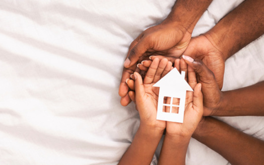 An average hotel room costs municipalities roughly $240 per night for one family and with families often scattered at various locations, social services can be difficult to administer. Transitional housing units would alleviate both costs and service gaps. (Adobe Stock)