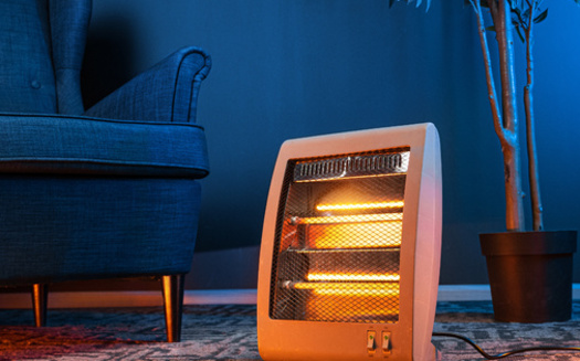 Fire-safety experts recommend keeping space heaters at least three feet away from things that can burn, such as paper, bedding or furniture. (Adobe Stock)