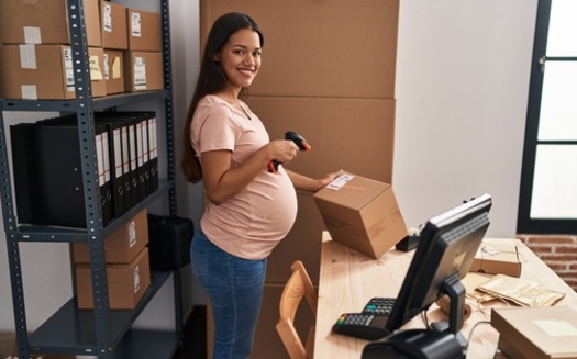 A national advocacy group says three-quarters of women in the United States who are entering the workforce will be pregnant and employed at some point of their lives. (Adobe Stock)