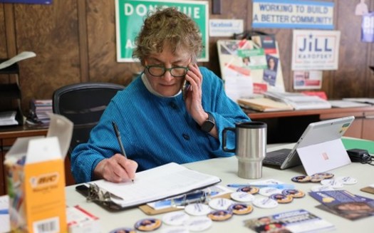 Mary Lynne Donohue, co-chair of the Sheboygan County Democratic Party, speaks with Sheboygan City Clerk Meredith DeBruin on Nov. 8 at Democratic Party headquarters in Sheboygan. (Coburn Dukehart / Wisconsin Watch)
