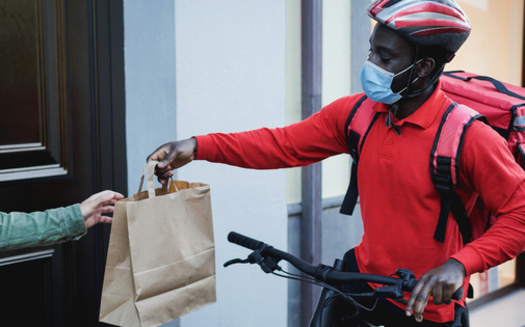 Starting in 2023, the pay rate for tipped service workers in the Commonwealth will increase from $6.15 an hour to $6.75, while time-and-a-half pay on Sundays and holidays will be eliminated completely. (Adobe Stock)