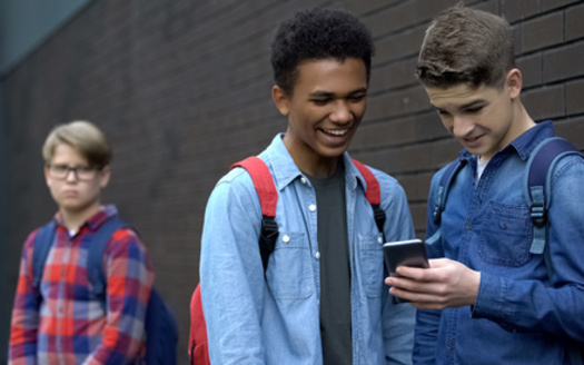 <a href="https://www.dosomething.org/us/facts/11-facts-about-cyber-bullying#fn11" target="_blank">Four out of five</a> students (81%) say they would be more likely to intervene in instances of cyberbullying if they could do it anonymously. (Adobe Stock)