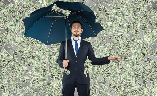 Billionaire wealth has increased by $2.7 billion per day, while more than 1.7 billion people live in countries where their wages, adjusted for inflation, have declined. (Adobe Stock)