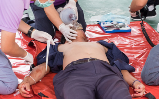 According to the American Heart Association, men having a heart attack might experience nausea or vomiting and shortness of breath, along with chest pain or pressure. Women might experience fainting, indigestion and extreme fatigue with chest pain or pressure. (Adobe Stock)