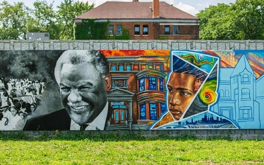 Storage batteries hidden behind this Bronzeville mural will be part of a microgrid system that will render the entire Chicago neighborhood energy-independent. (ComEd)