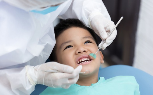 According to McGinley, common problems during the age of six to 12 include malocclusion, like cross-bites or overbites and the development of crooked or crowded teeth. (Adobe Stock) 
