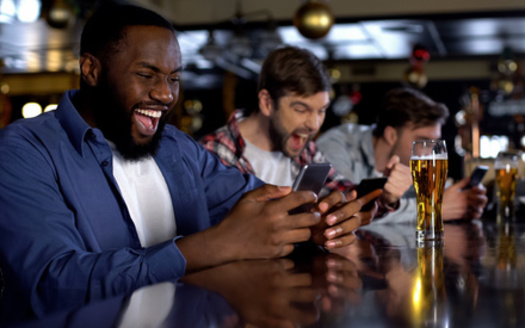 Problem gambling experts say commercials for sports betting apps often portray the activity as a fun, social event, with not enough information about the potential risks. (Adobe Stock)