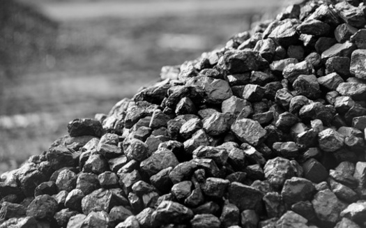 Coal dust is one of several sources of soot, the fine particulate matter which has major effects on people's health. (Adobe Stock)