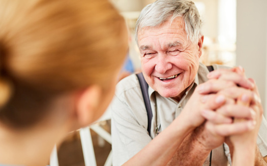 Beyond providing relief to family caregivers, adult day-care programs create opportunities for people living with dementia to be in social settings with professional supervision. (Adobe Stock)