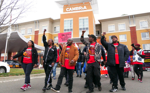 Workers at Cambria Suites and Hotel in Morrisville, N.C., and colleagues from the Union of Southern Service Workers rally Feb. 20 for better pay, benefits and workplace safety. (Herb White) 