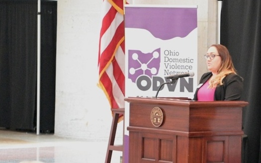 Ohio Domestic Violence Network Policy Director Maria York addresses legislators, domestic violence advocates and news media at the Ohio Statehouse during a recent Advocacy Day event. (Ohio Domestic Violence Network)