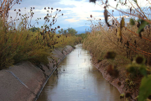 Despite climate change, water-rights transfers and development, approximately 750 centuries-old acequias still operate in New Mexico. (MayaPena/lasacequias.org)