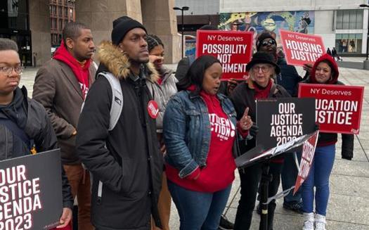 At a rally in Harlem, members of Citizen Action of New York call for a bevy of changes to public money in Albany. They want taxes raised on the wealthiest New Yorkers, to increase the state's minimum wage, and to end 'pay-for-play' by reducing state subsidies for corporations. (Citizen Action New York)