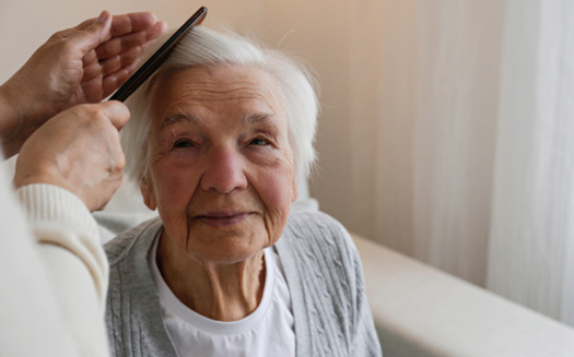 A new report found nationally, the estimated economic value of family caregivers' unpaid contributions in 2021 was $600 billion. (Evrymmnt/Adobe Stock)