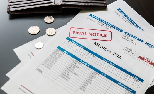 Illinois advocacy groups say they are educating policymakers on the benefits of hospital screening as a solution to prevent medical debt, both for low-income patients and the hospital. (volgariver/Adobe Stock)