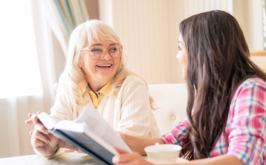 Family caregivers provided 770 million hours of unpaid work in Washington state in 2021. (Svyatoslav Lypynskyy/Adobe Stock)