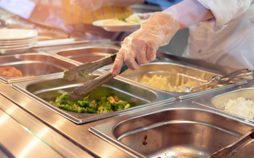 Supporters of providing no-cost school meals to all students argue that it helps them learn better, reduces stigma, and provides financial relief to working families. (Adobe Stock)