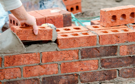 Native American advocates in Bismarck say new housing development is often built in communities separated from their populations, and a lot of infrastructure funding goes to improve those areas, leaving older neighborhoods to deteriorate. (Adobe Stock)