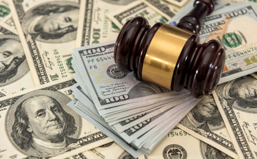 In New York and several other states, a person's inability to pay does not exempt them from owing certain court fees and surcharges, according to a report by the Fines and Fees Justice Center. (Adobe Stock)