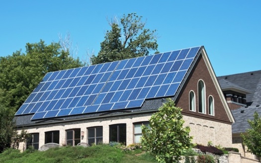 Investing in solar produces zero carbon emissions and other heat-trapping greenhouse gases and improves cost efficiency over time, which will end up saving on energy bills, according to Iowa Interfaith Power and Light. (Adobe Stock)