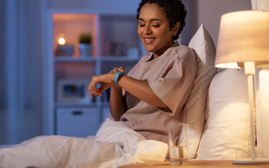 Whether it's reading or listening to music, experts say establishing a nightly routine is critical to getting a good night's sleep. (JenkoAtaman/AdobeStock)