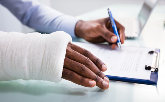 Injury compensation cases can often be uphill battles for workers. (Andrey Popov/Adobe Stock)