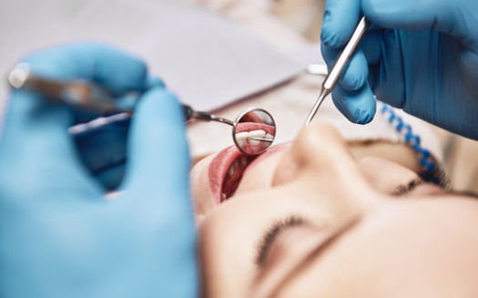 Dental therapists are authorized to practice in at least a dozen states. (Friends Stock/Adobe Stock)