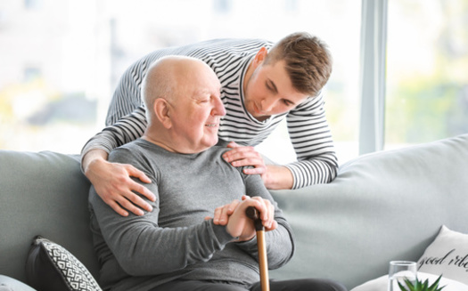 In a new AARP poll, 43% of respondents said they would be motivated to support political candidates who vow to expand access to family caregiver support and respite services. (Adobe Stock)